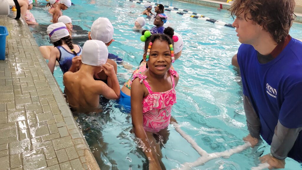 Kids swimming at Northridge Country Club summer camp pool